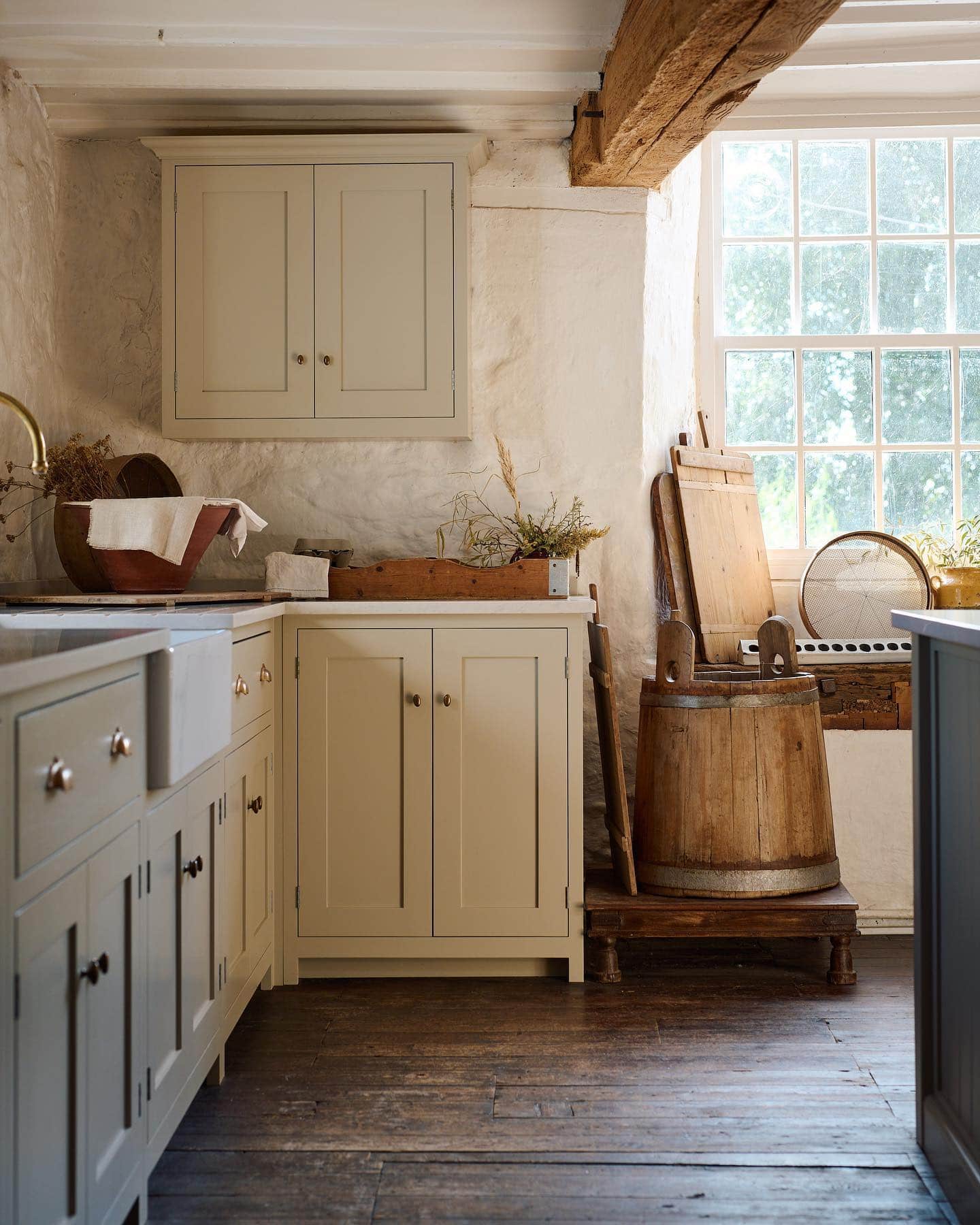 Neutral kitchen cabinet colors example featuring a modern traditional kitchen idea with crisp white cabinets.