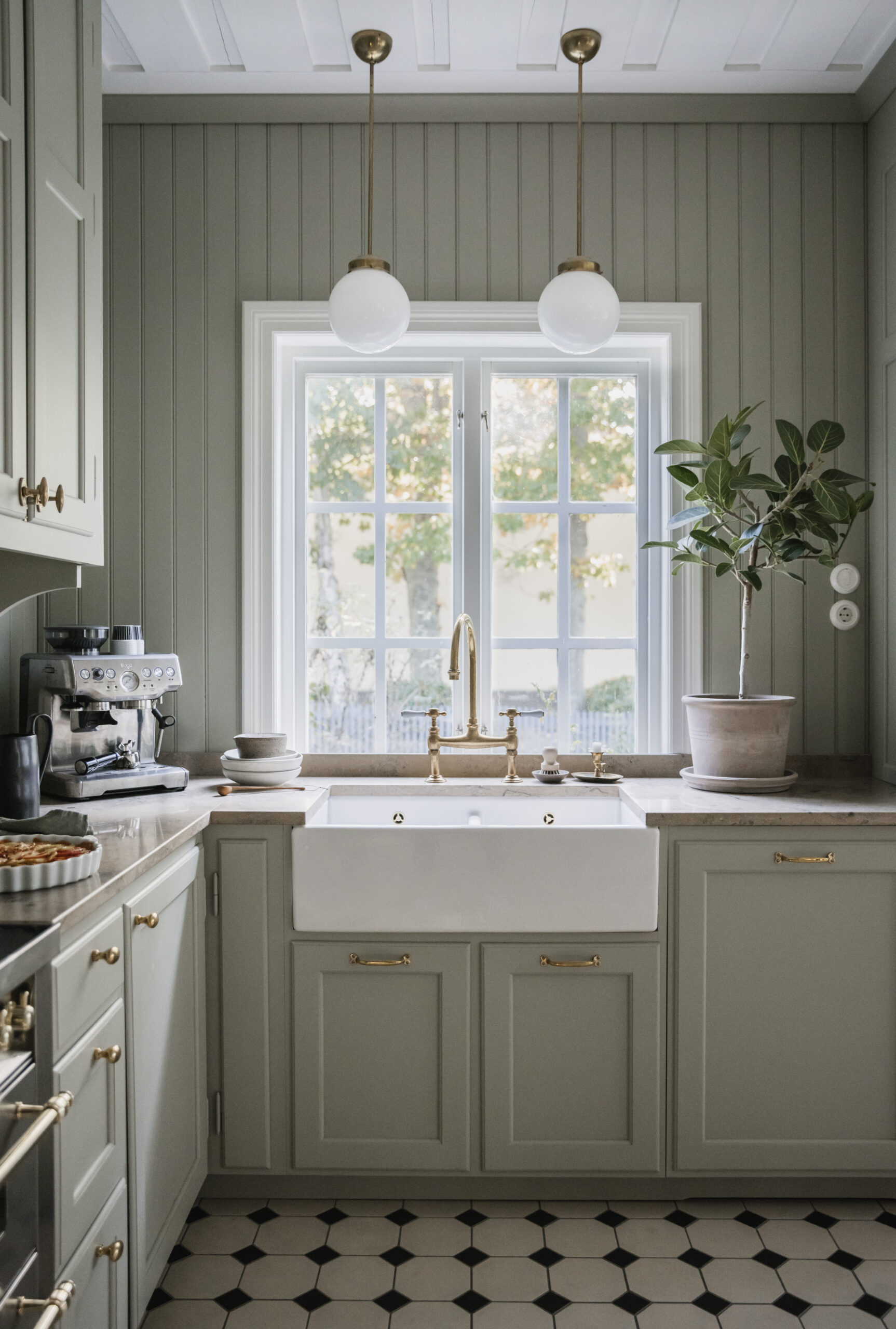 Neutral kitchen cabinet colors example featuring a modern traditional kitchen idea with light blue gray cabinets.
