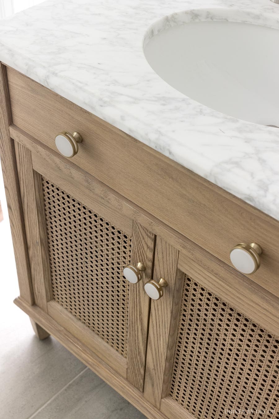 Budget bathroom remodeling ideas featuring natural wood cabinets