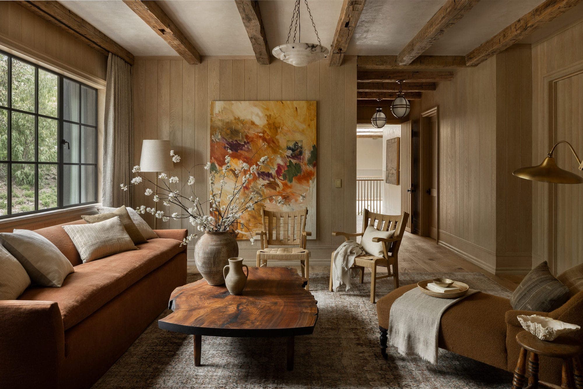 Californian-Inspired Luxury Aesthetic idea featuring sophisticated new traditional style living room designed by Amber Lewis