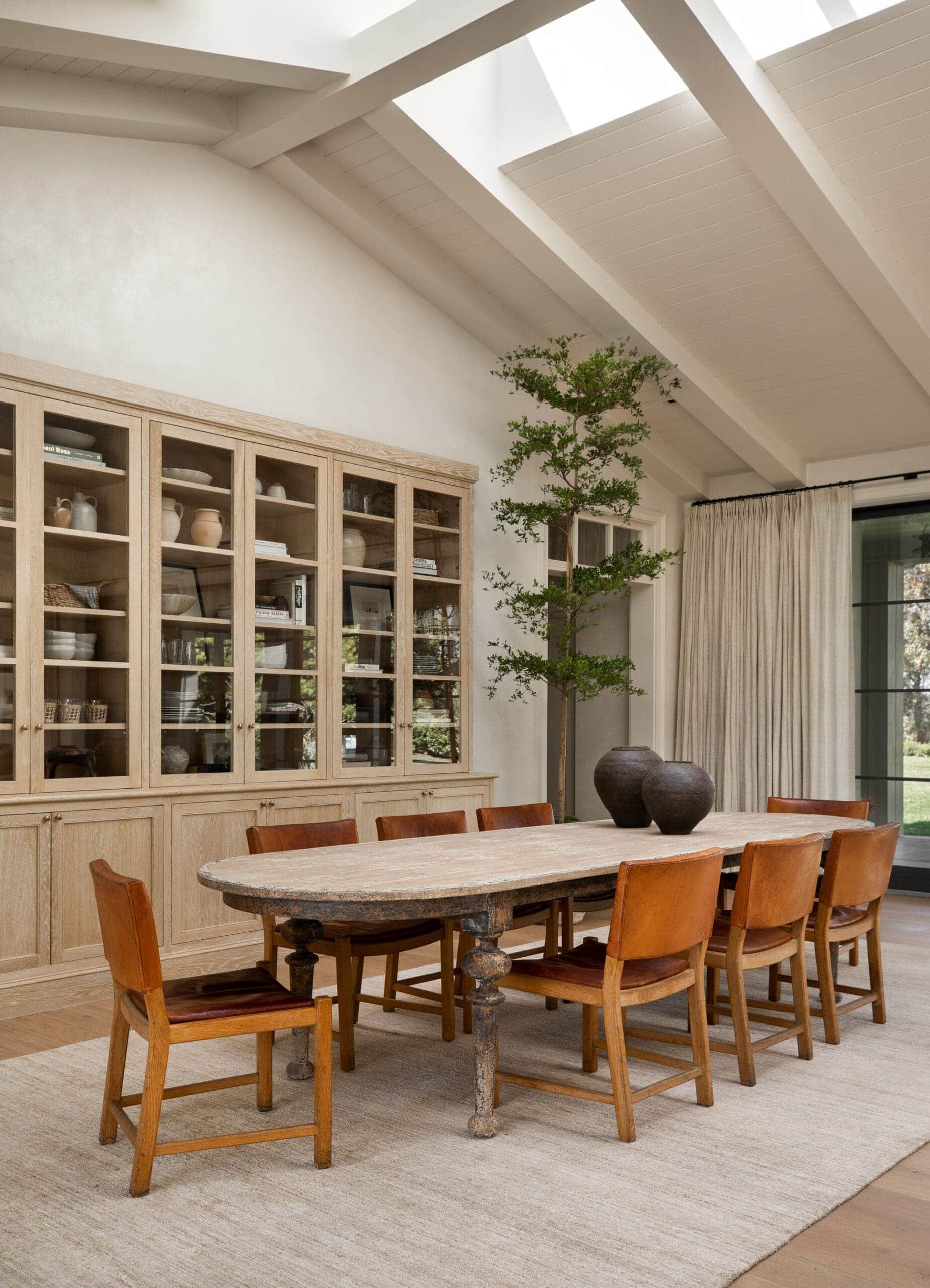 Californian-Inspired Luxury Aesthetic idea featuring bnew traditional style dining room designed by Amber Lewis