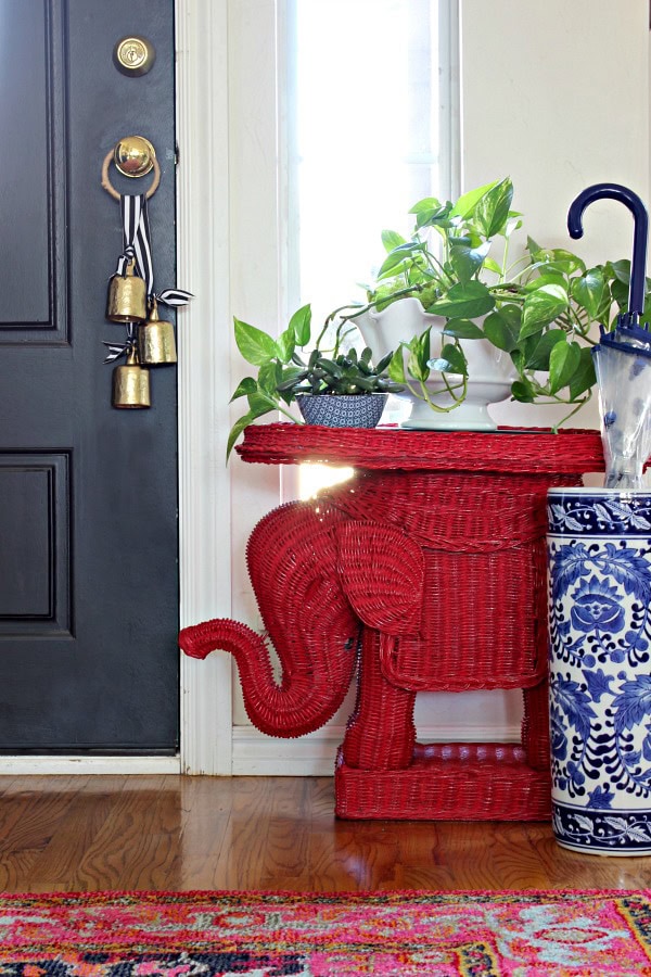 Example of traditional with red side table in red foyer decorating ideas