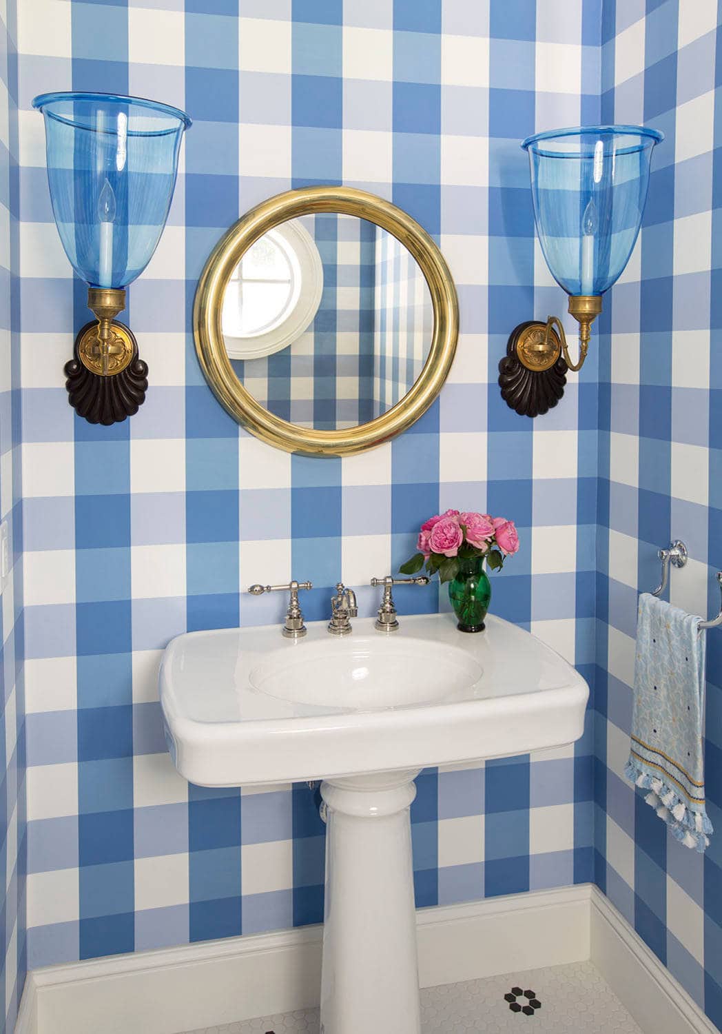 Coastal lake house with colorful tropical accents featuring a bathroom