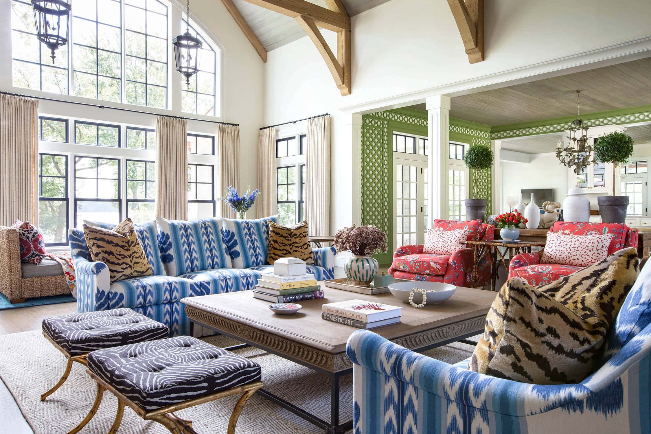 Coastal lake house with colorful tropical accents featuring a living room