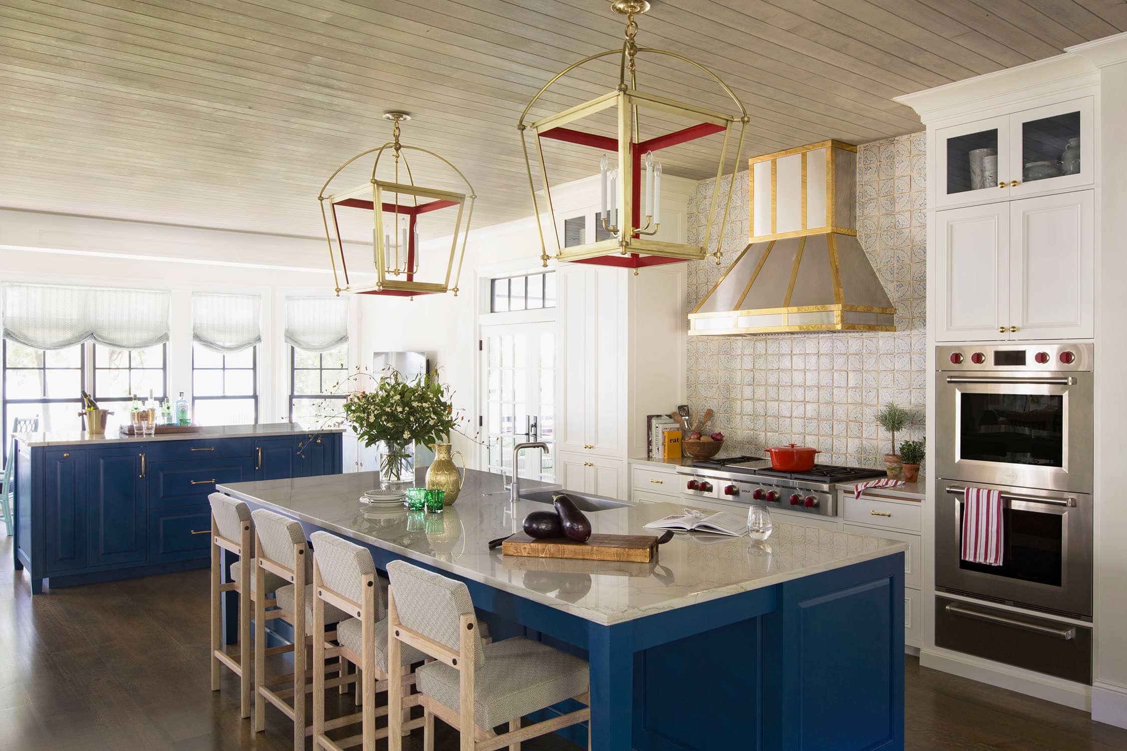 Coastal lake house with colorful tropical accents featuring a kitchen