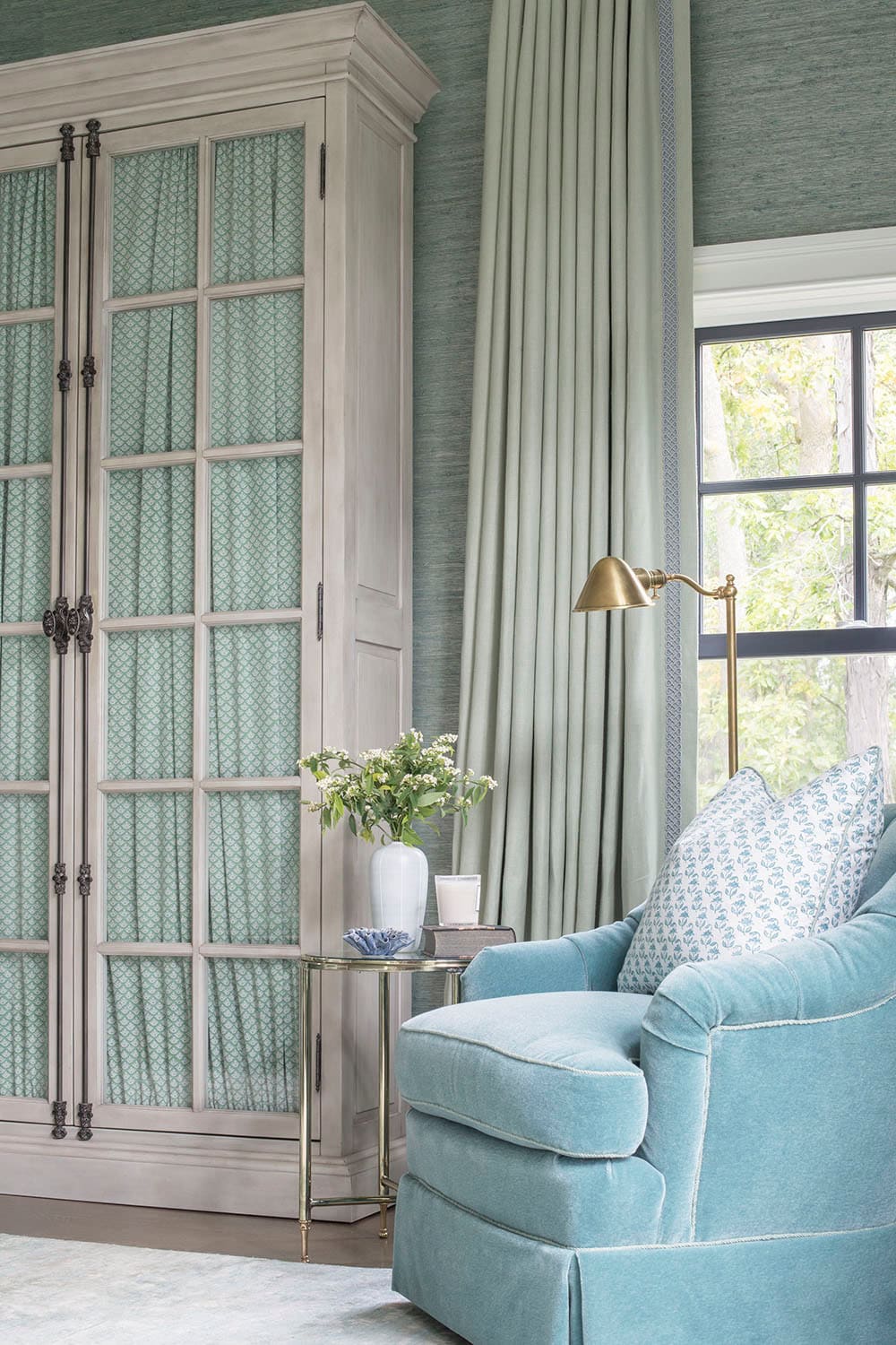 Coastal lake house with colorful tropical accents featuring a living room