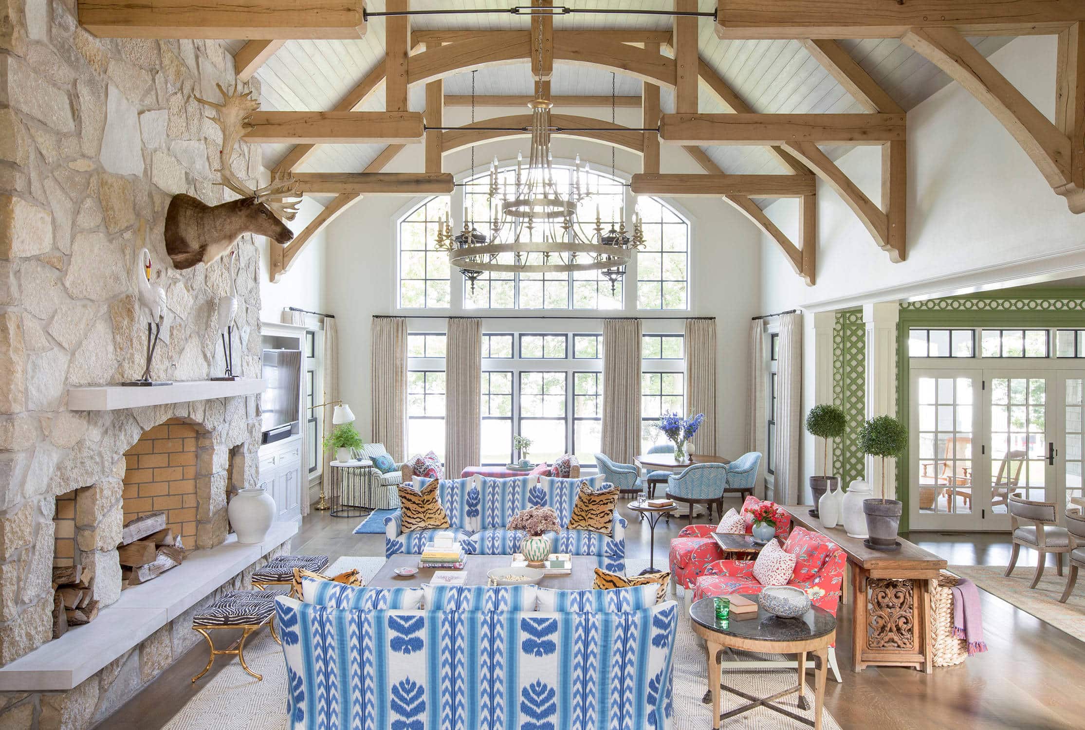 Coastal lake house with colorful tropical accents featuring a living room