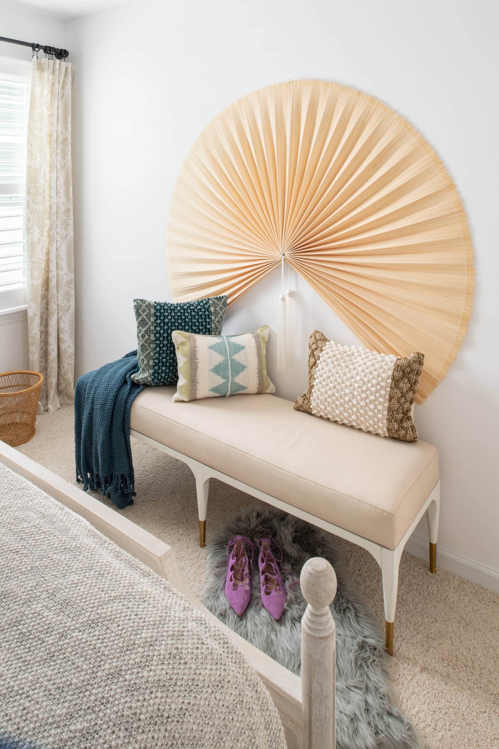 Modern beach style bedroom with wood flooring and coastal accents