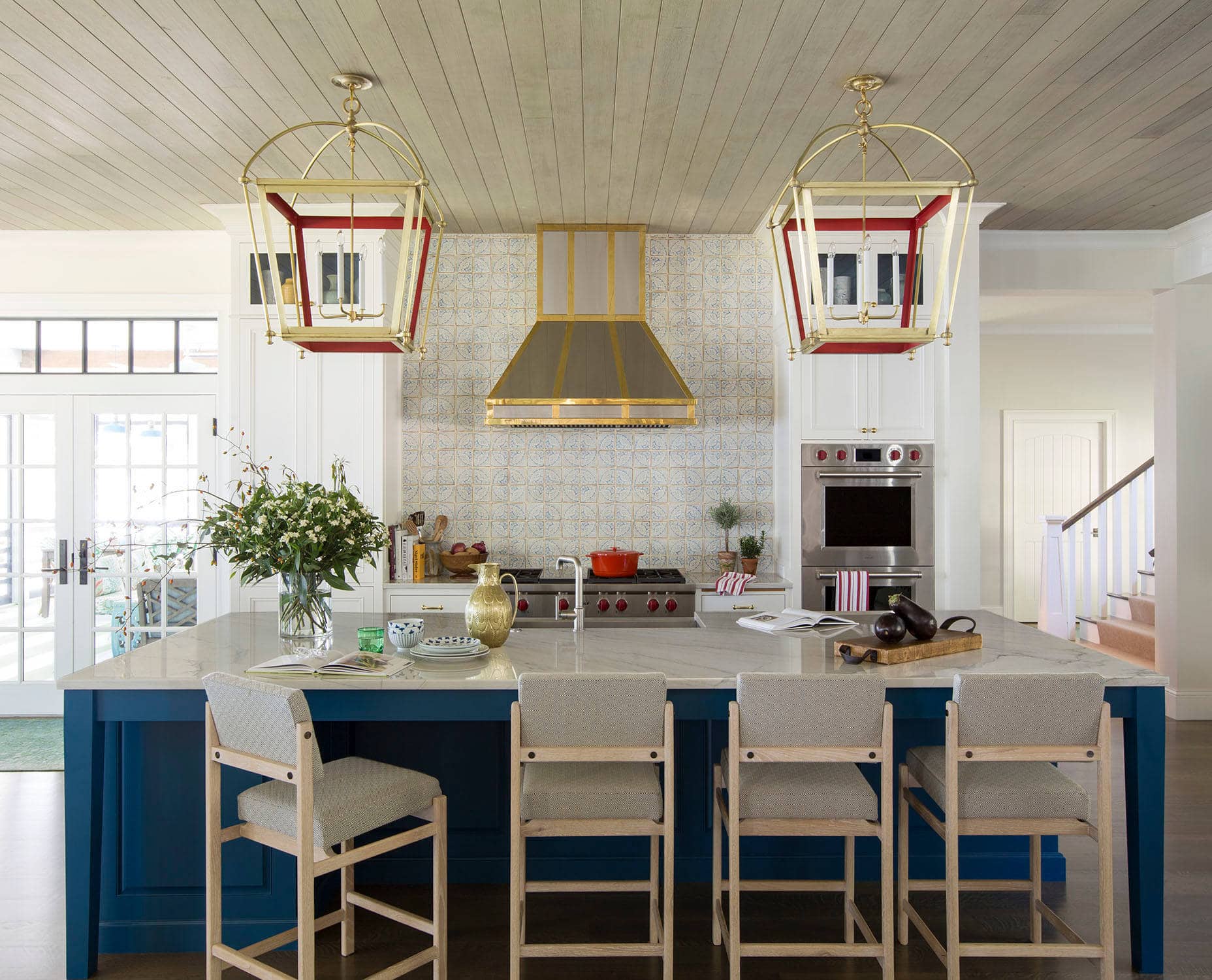 Coastal lake house with colorful tropical accents featuring a kitchen