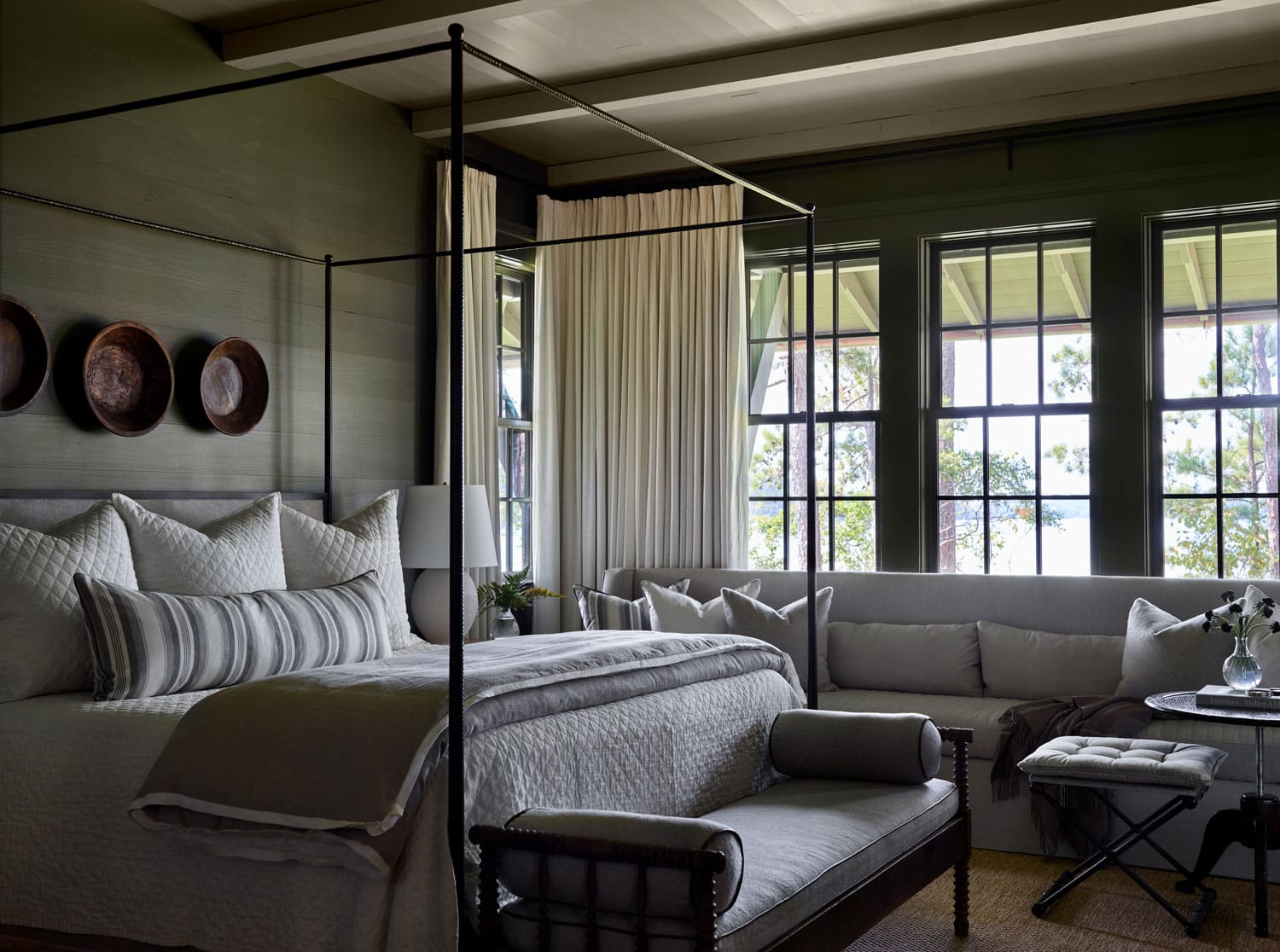 Designer Spotlight about Ashley Gilbreath Interiors Design project featuring a bedroom in a traditional style mixed with coastal and modern home accents.