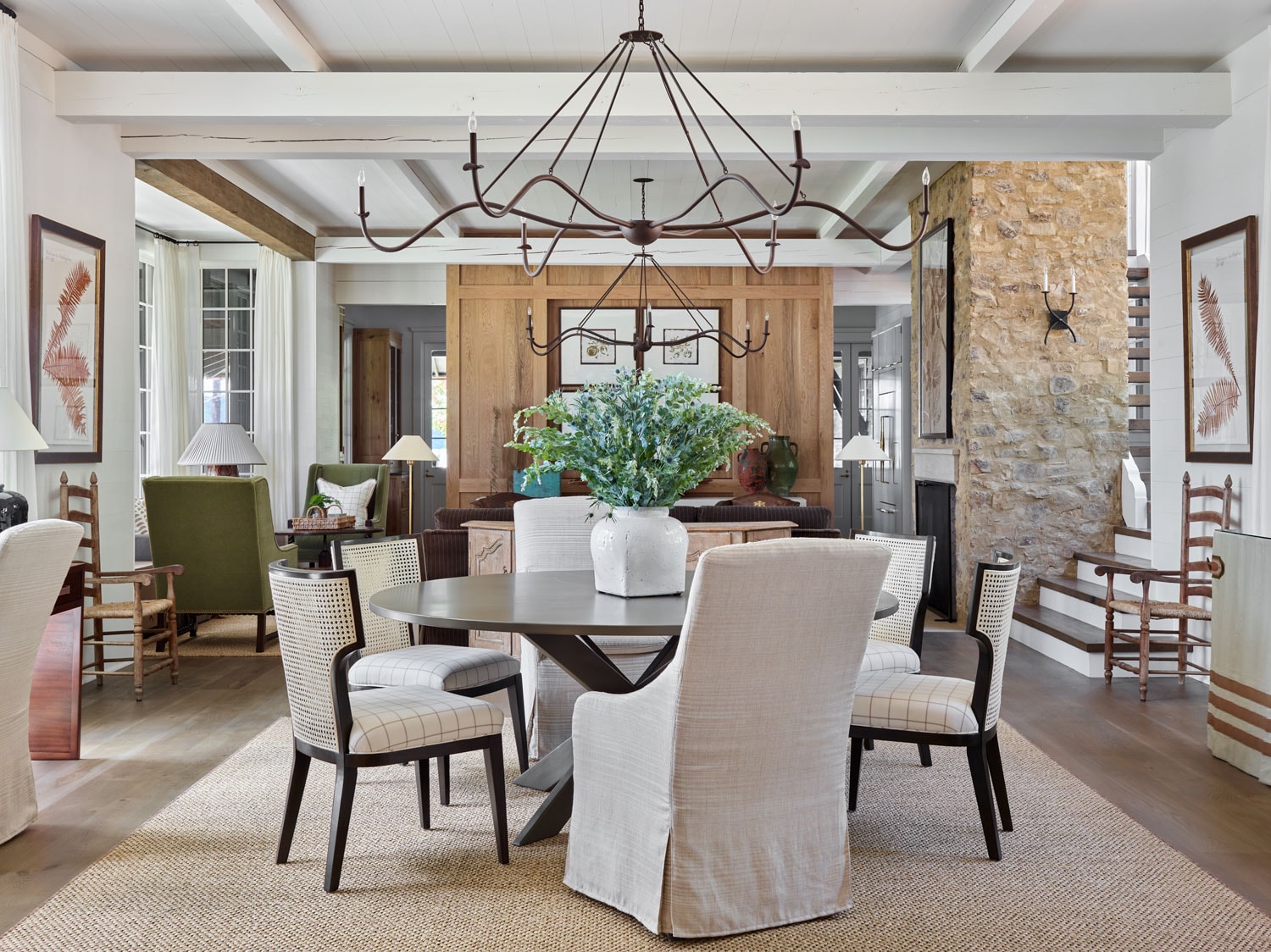 Designer Spotlight about Ashley Gilbreath Interiors Design project featuring a dining nook in a traditional style mixed with coastal and modern home accents.