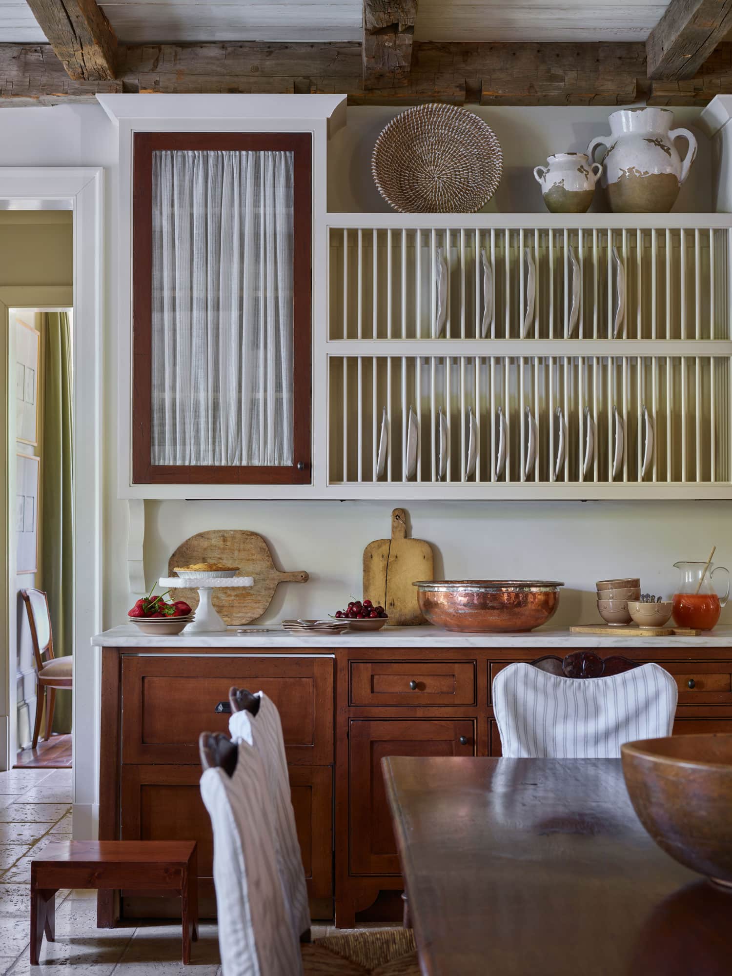 Designer Spotlight about Ashley Gilbreath Interiors Design project featuring a kitchen with traditional style with modern touches.