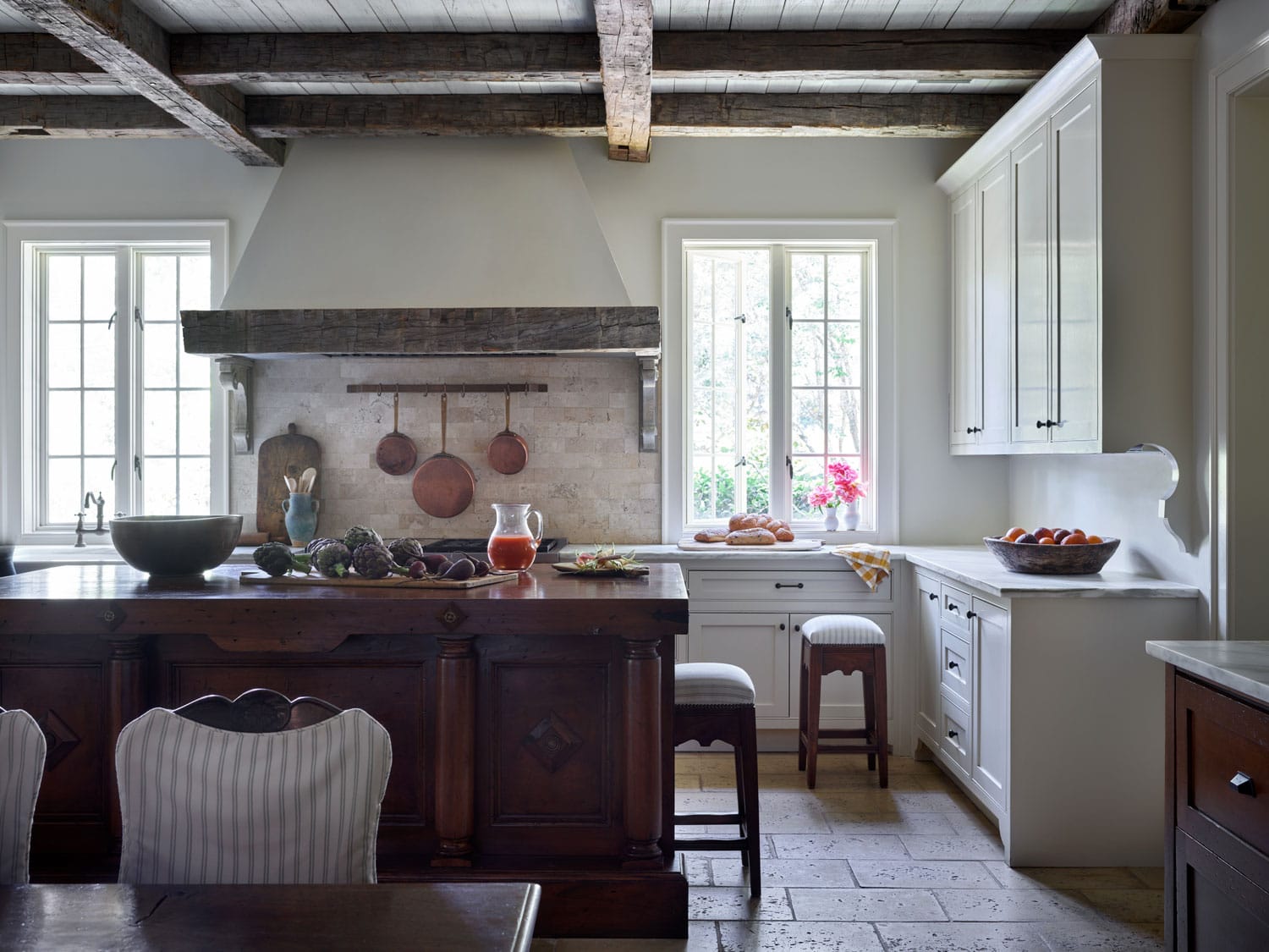 Designer Spotlight about Ashley Gilbreath Interiors Design project featuring a kitchen with traditional style with modern touches.
