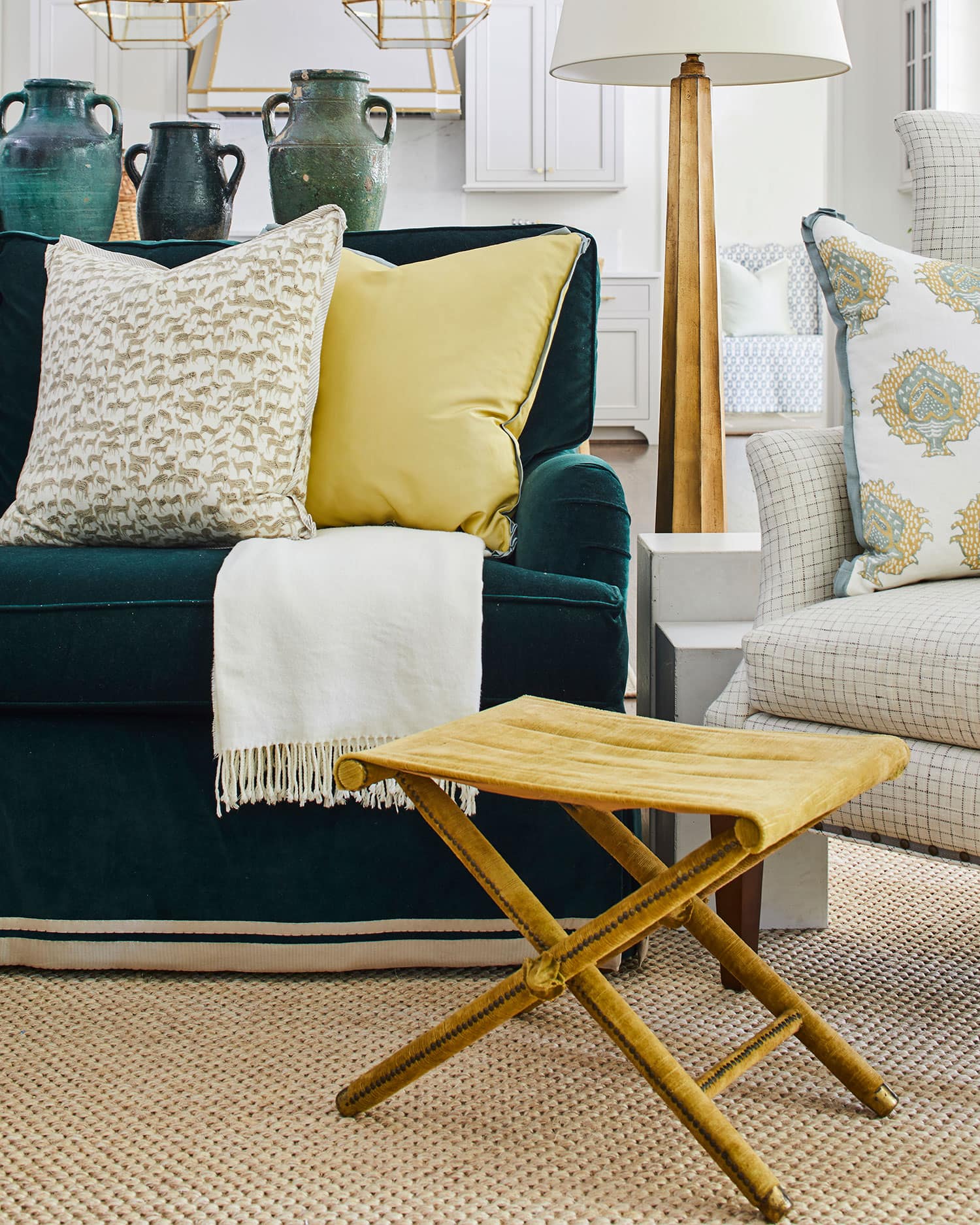 Designer Spotlight about Ashley Gilbreath Interiors Design project featuring a living room with traditional style with contemporary touches.