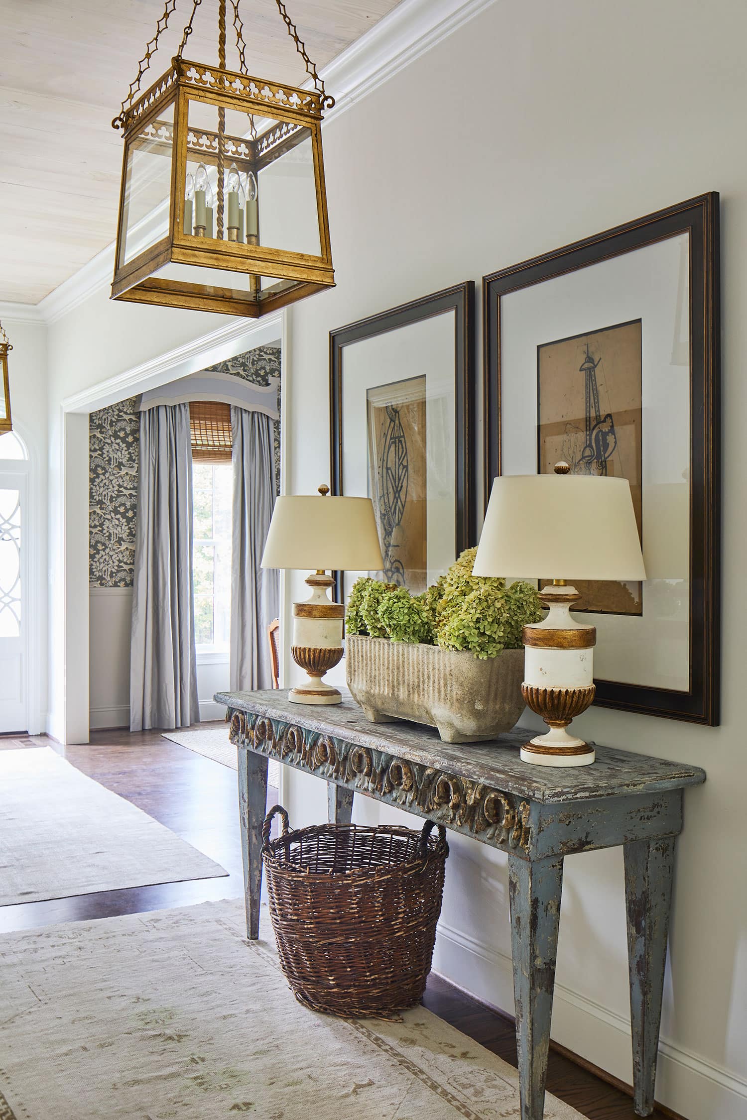 Designer Spotlight about Ashley Gilbreath Interiors Design project featuring a living room with traditional style with contemporary touches.