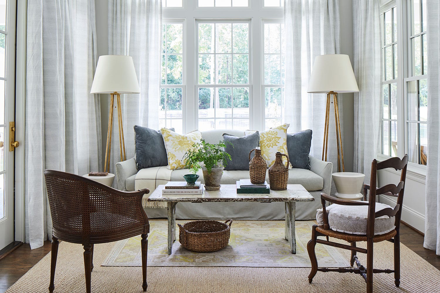 Designer Spotlight about Ashley Gilbreath Interiors Design project featuring a living room with traditional style with contemporary touches.