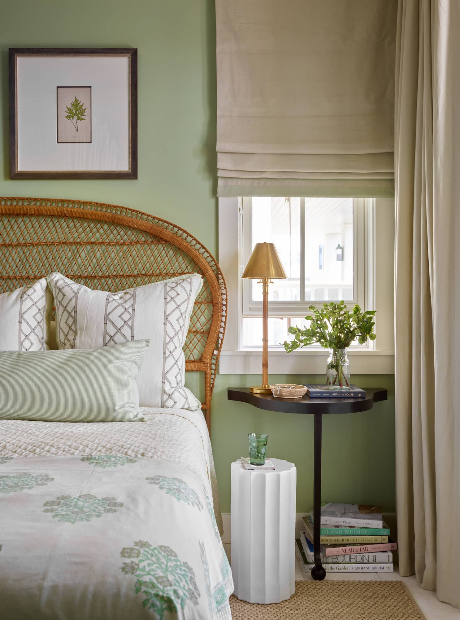 Designer Spotlight about Ashley Gilbreath Interiors Design project featuring a bedroom with pops of green and rustic textures in a tropical style mixed with traditional and modern home accents.