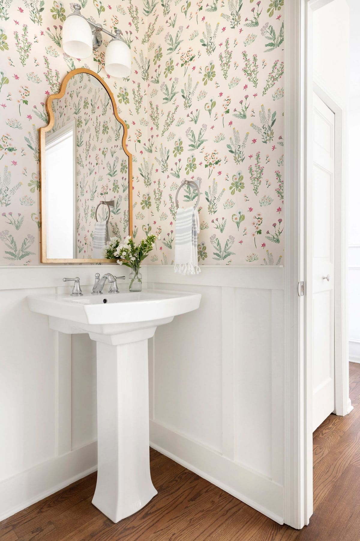 Powder room in a classic fresh traditional decor style by Bria Hammel Interiors