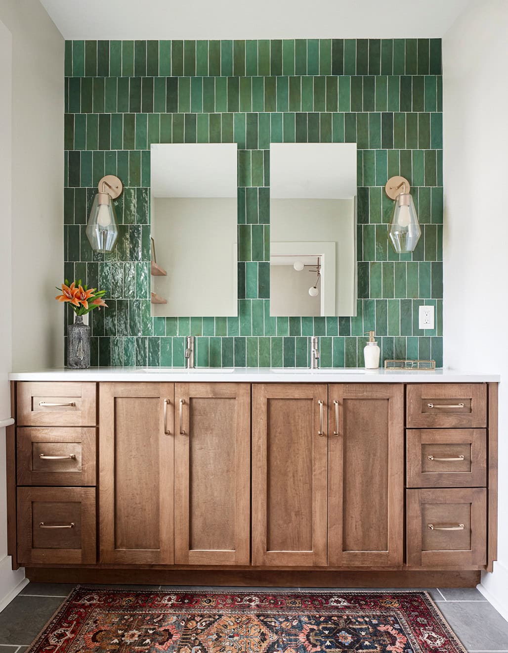 Modern bathroom showcasing a green tile accent wall featured as part of focal point tips