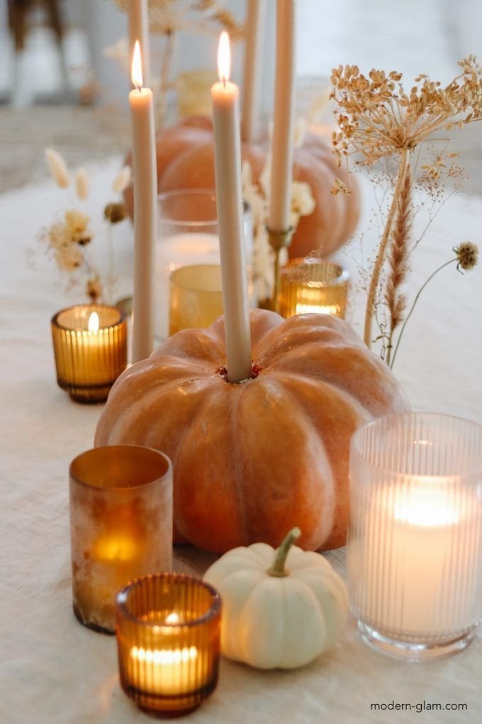 Fall decor idea featuring tablescapade with dollar store finds with pumpkins