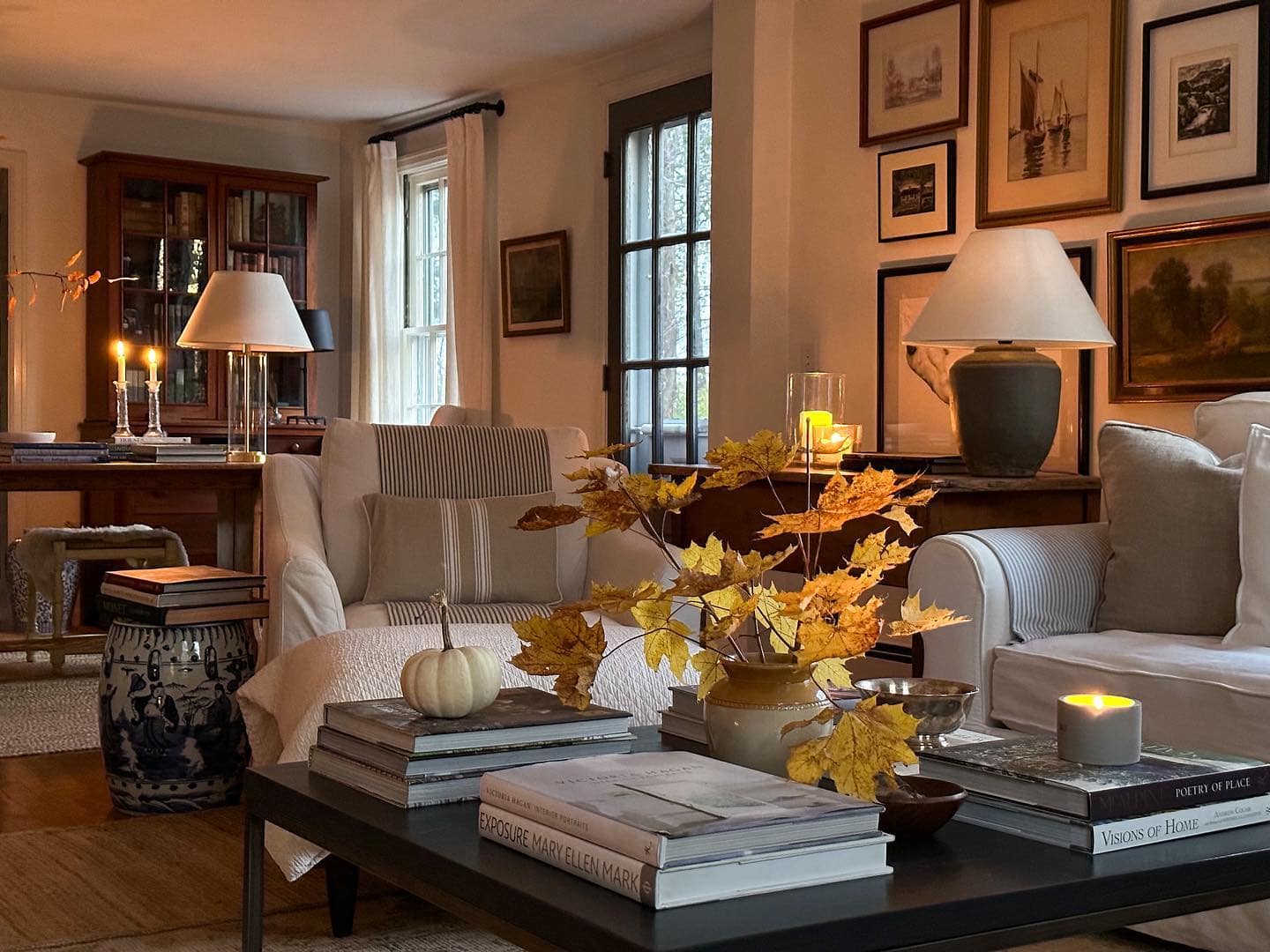 Fall decor for living room idea featuring neutral Nancy Meyers inspired living room