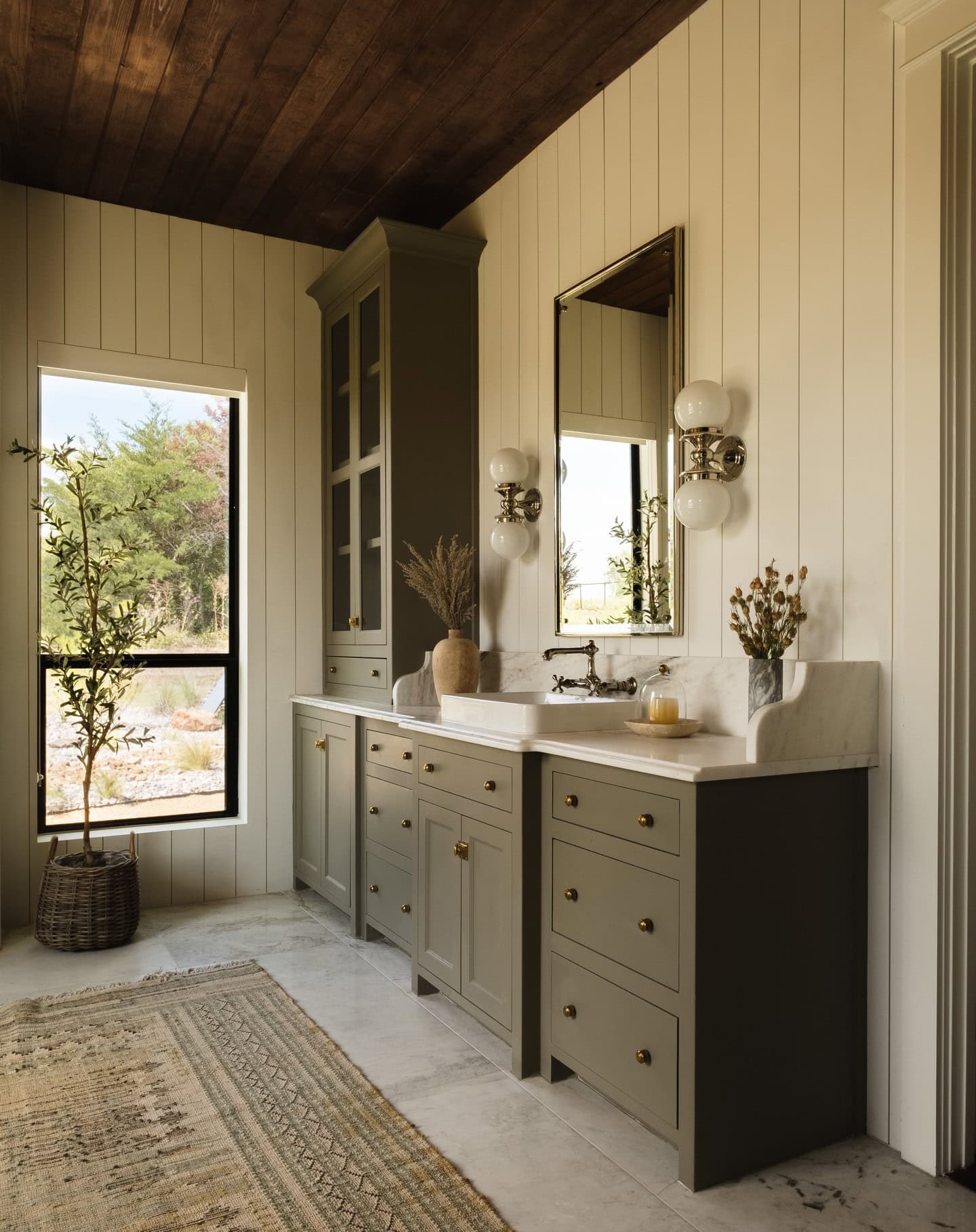 Fall bathroom decor idea featuring modern transitional bathroom in earthy tones