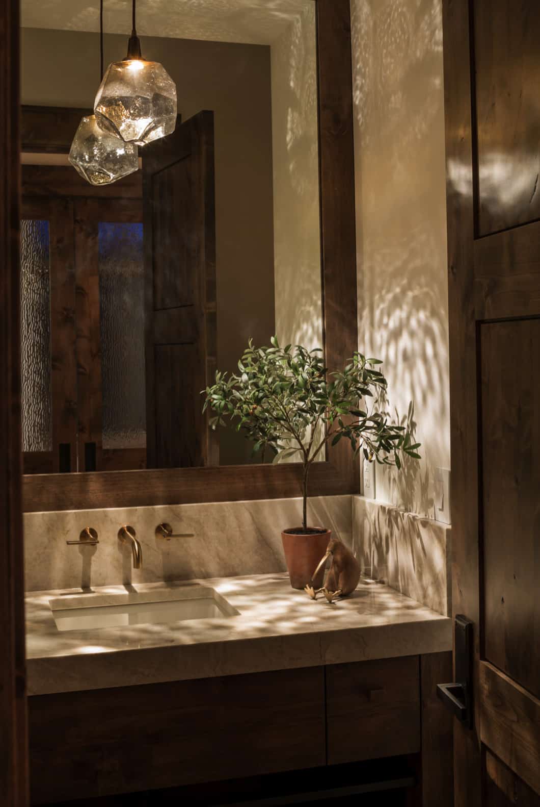 Fall bathroom decor idea featuring pendant lights and cozy ambience
