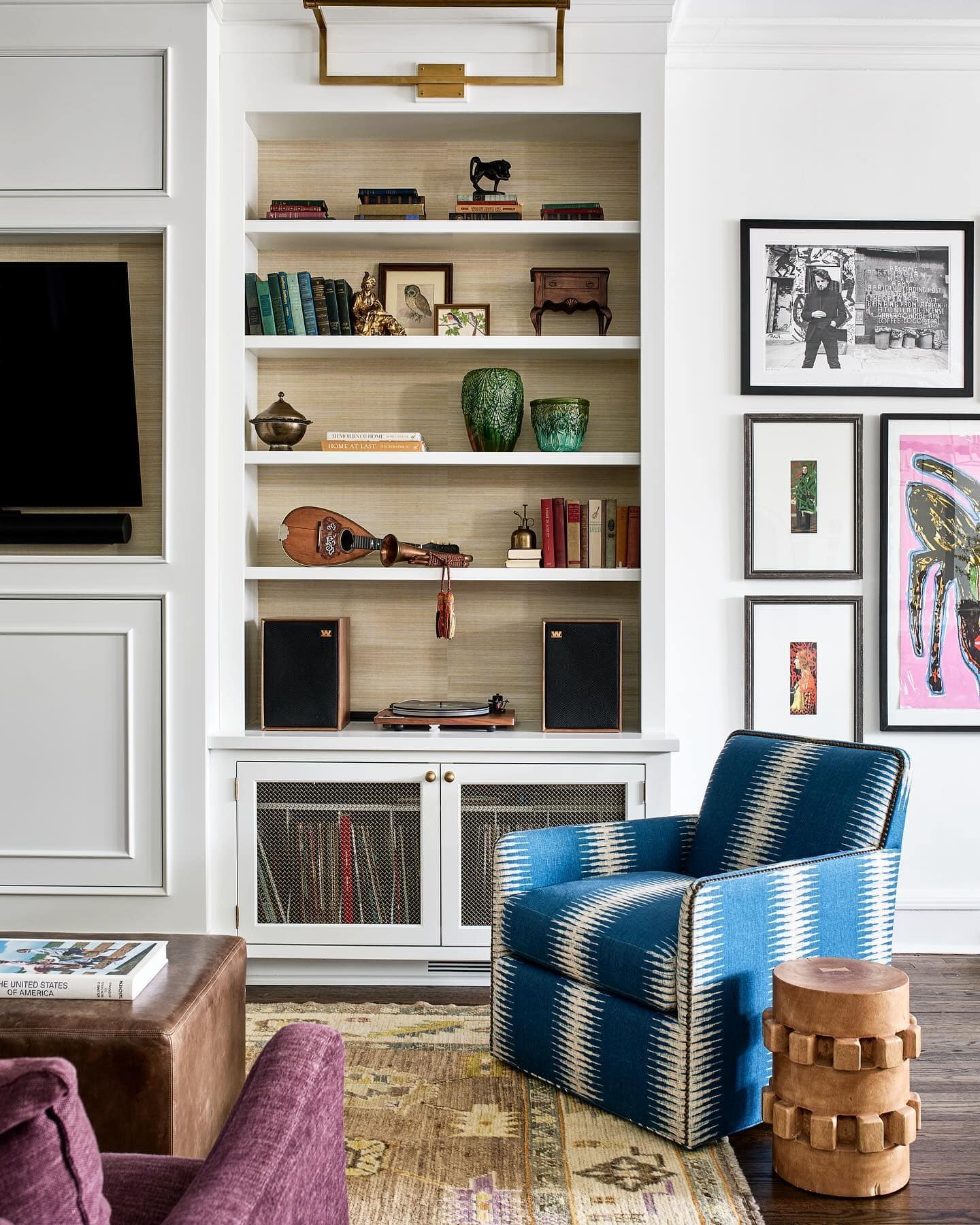 Fall decor for living room idea featuring striped white and blue armchair in transitional living room