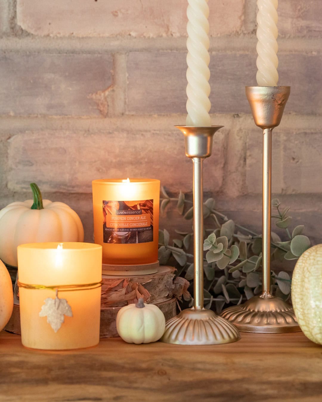 Fall decor idea featuring fall-themed candles from the dollar store