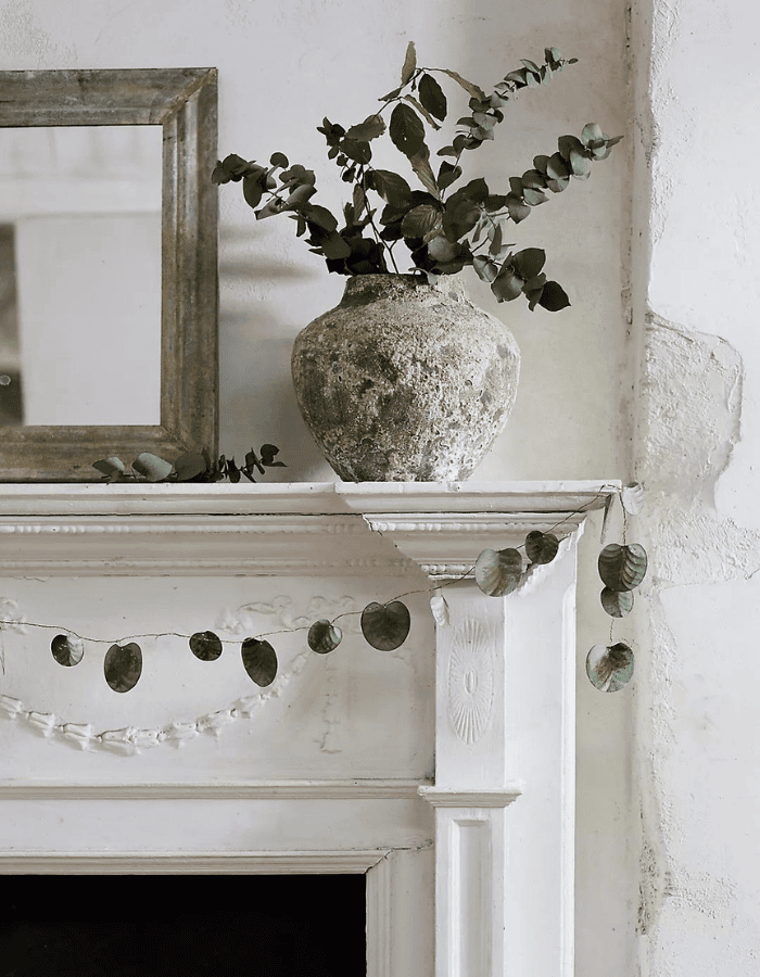 Fall mantel ideas for living room decor featuring a modern rustic fireplace mantel