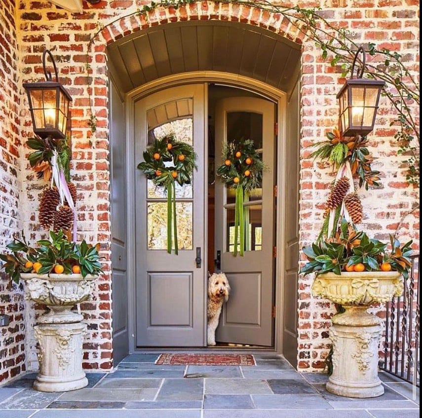 Example of fall porch decorations featuring a front porch with seating area