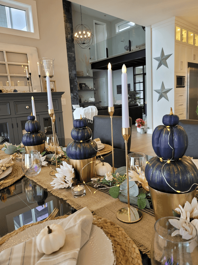 Fall decor idea featuring table setting with blue pumpkins