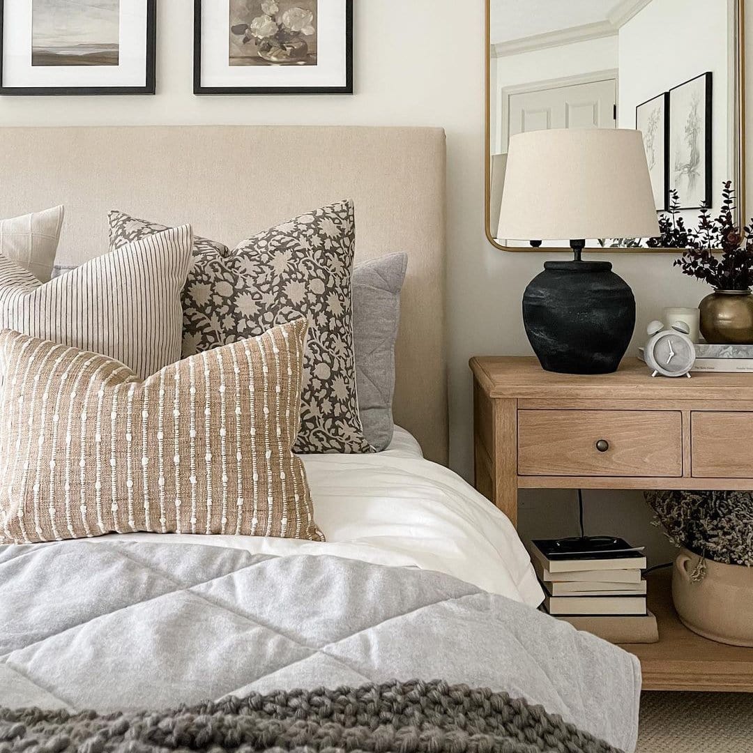 Example of throw pillow combo in modern traditional style bedroom i