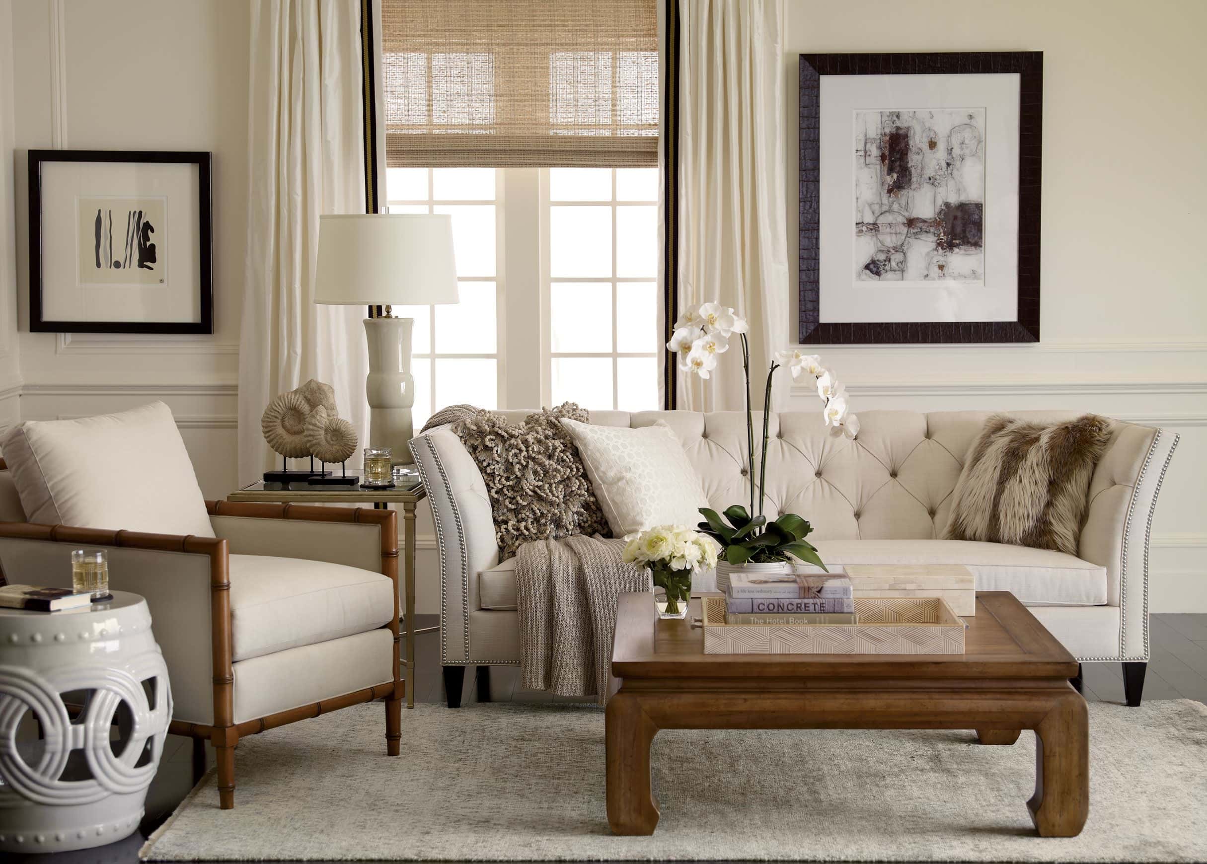 Fall decor for living room idea featuring neutral sofa in traditional modern living room