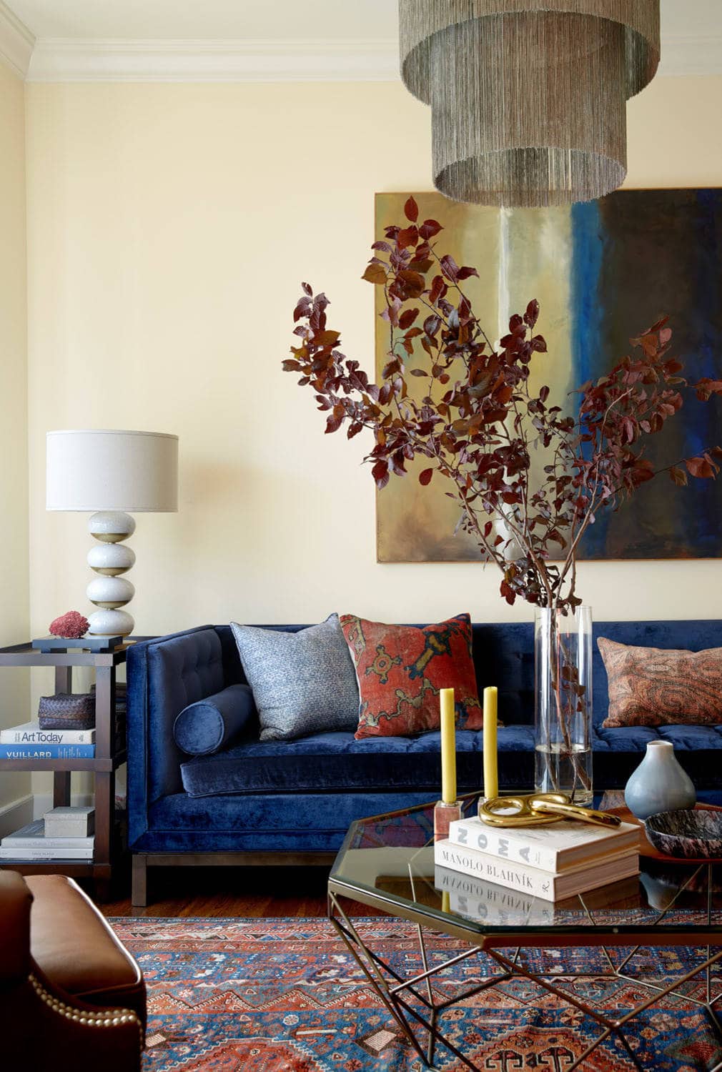 Fall decor for living room idea featuring blue and brown orange color scheme in traditional modern living room