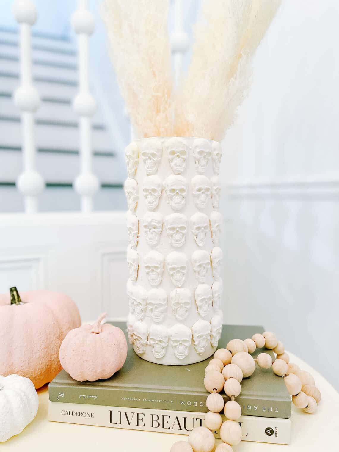 white skulls vase example of easy DIY Halloween decorations idea