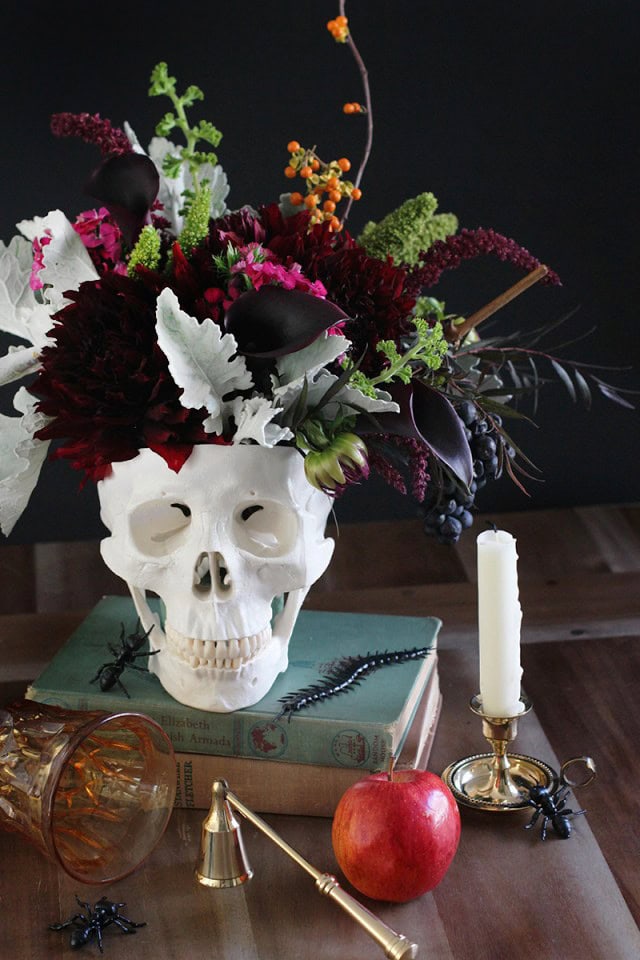 floral arrangement with skull example of easy DIY Halloween decorations idea