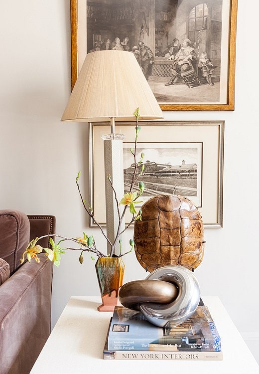 Example of living room in contemporary style of how to mix metals when decorating