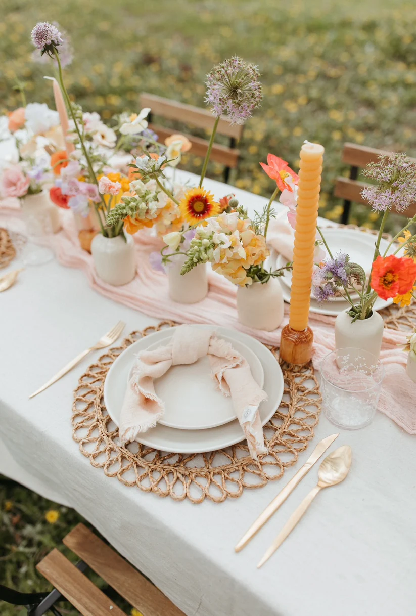 Example of romantic pink and orange trendy Thanksgiving Tablescape Ideas to Wow Your Guests