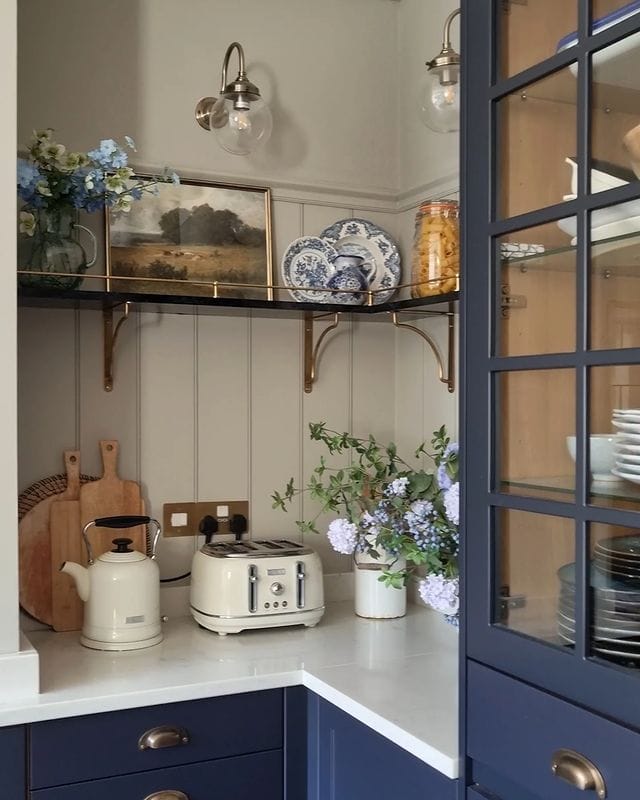 Example of kitchen in vintage style of how to mix metals when decorating