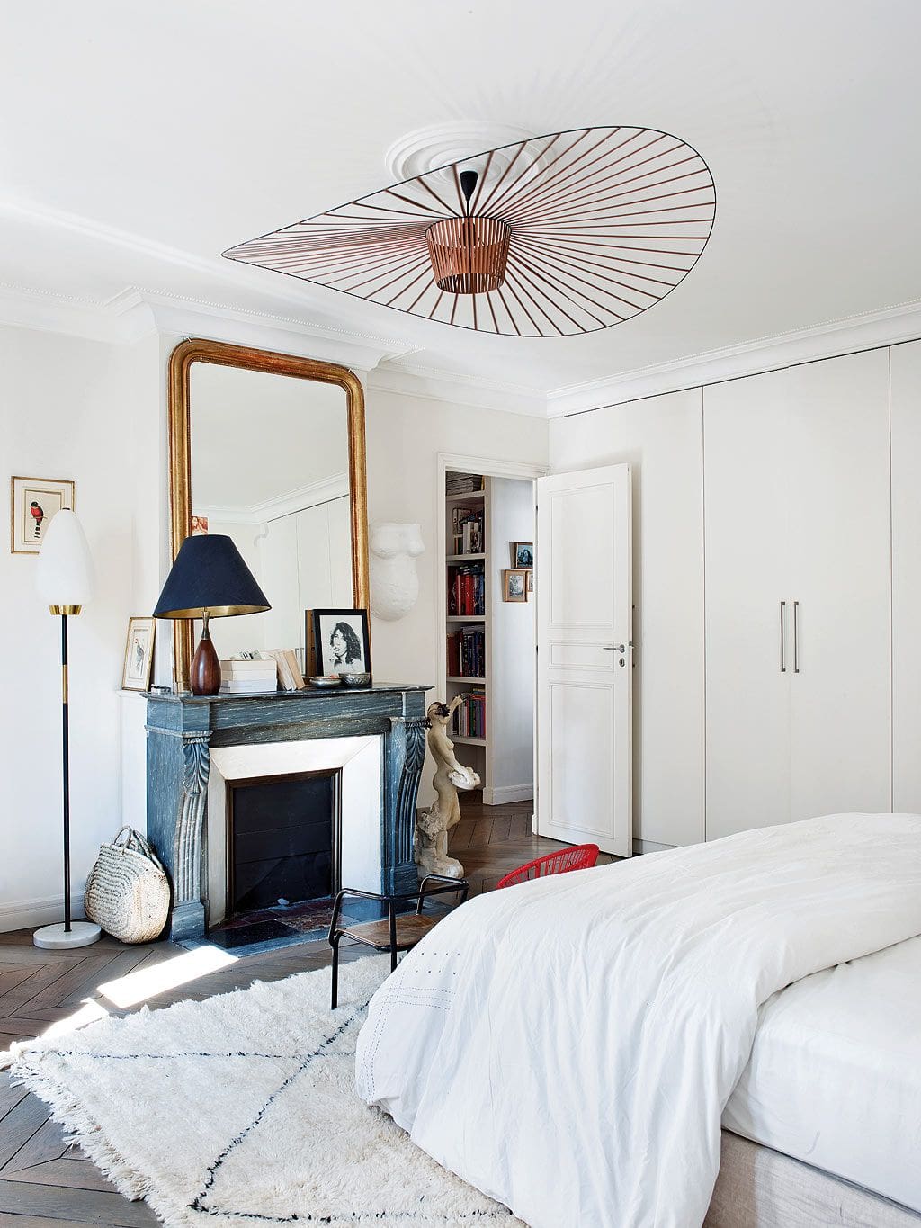 Example of bedroom in contemporary style of how to mix metals when decorating