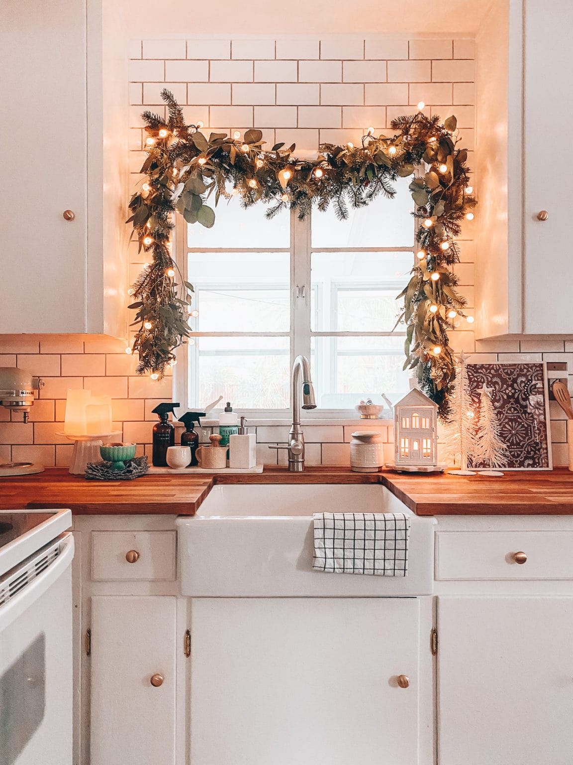 Charming apartment Christmas decorations and tips, example of kitchen decor.