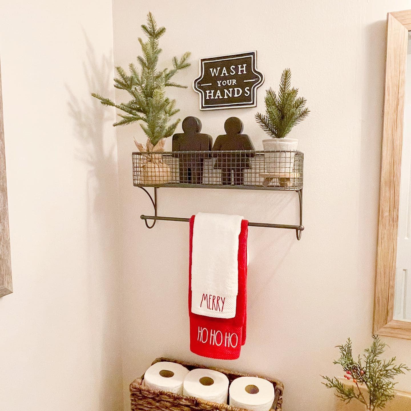 Ideas and tips for Christmas bathroom decor featuring a bathroom with farmhouse style, showcasing red and white color scheme.