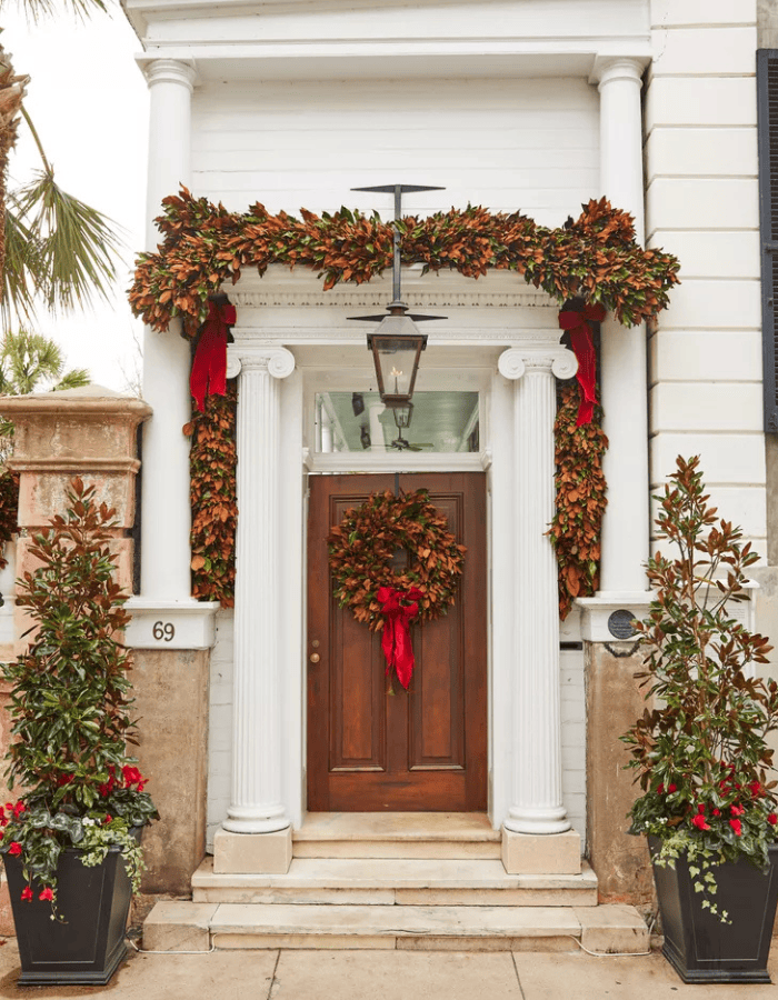 Create magical Christmas porch decor with these ideas example featuring a traditional decorated front porch