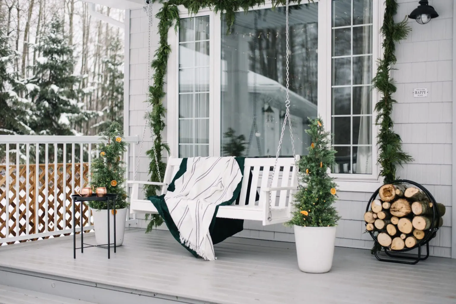 Create magical Christmas porch decor with these ideas example featuring a traditional decorated front porch facade