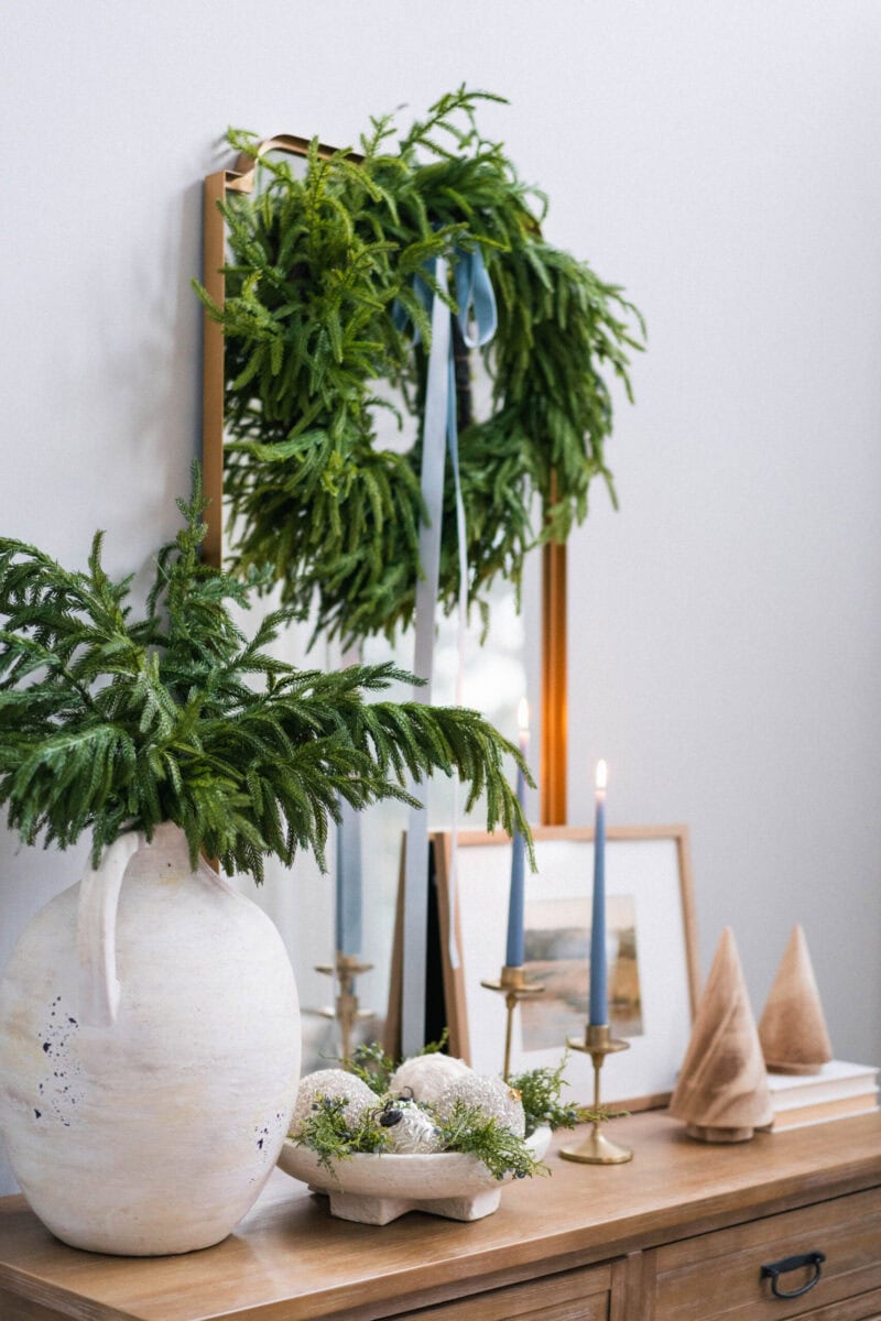 Example of cozy Christmas decor featuring living room decorated in coastal style.