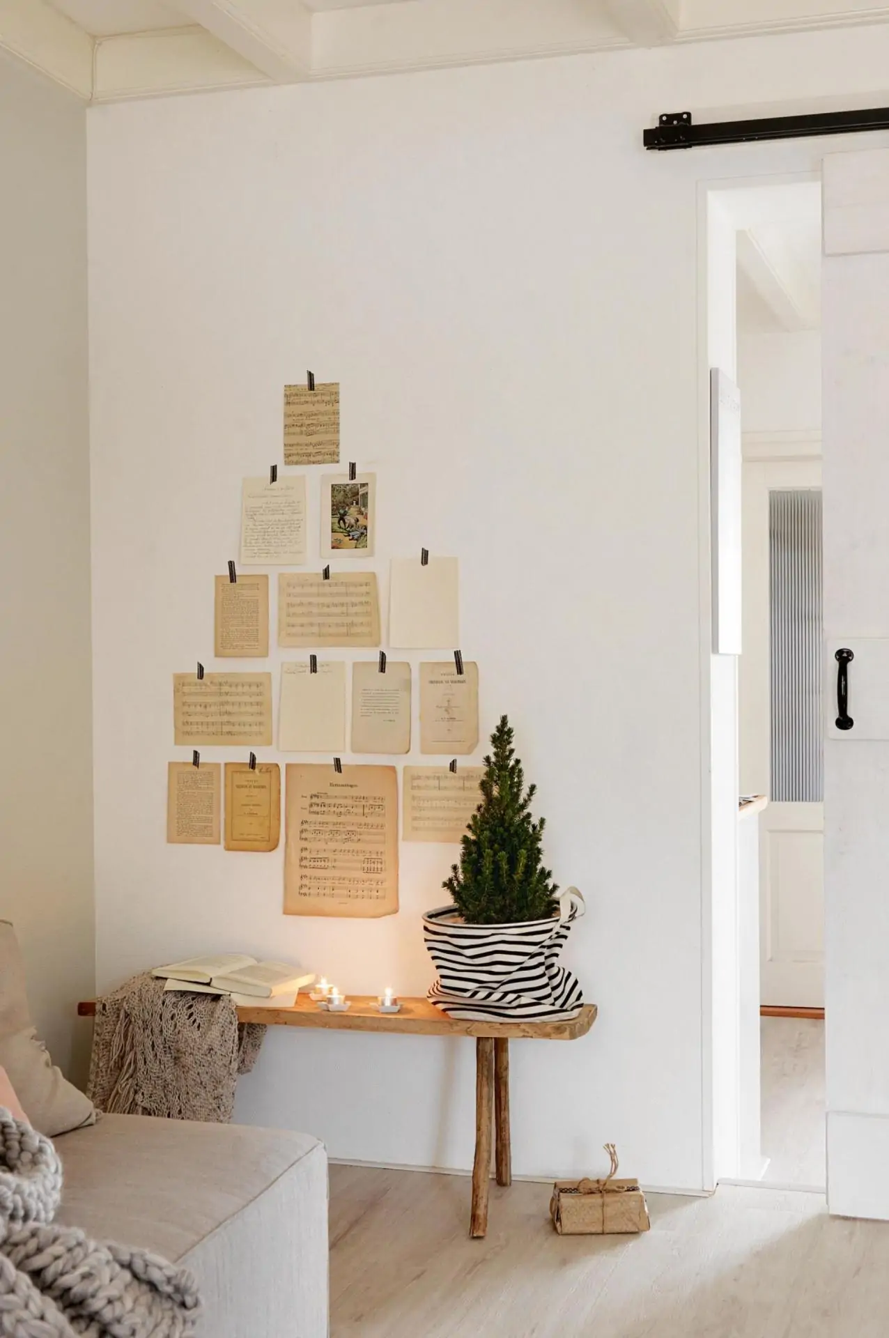 Example of cozy Christmas decor featuring a small decorated in farmhouse style.