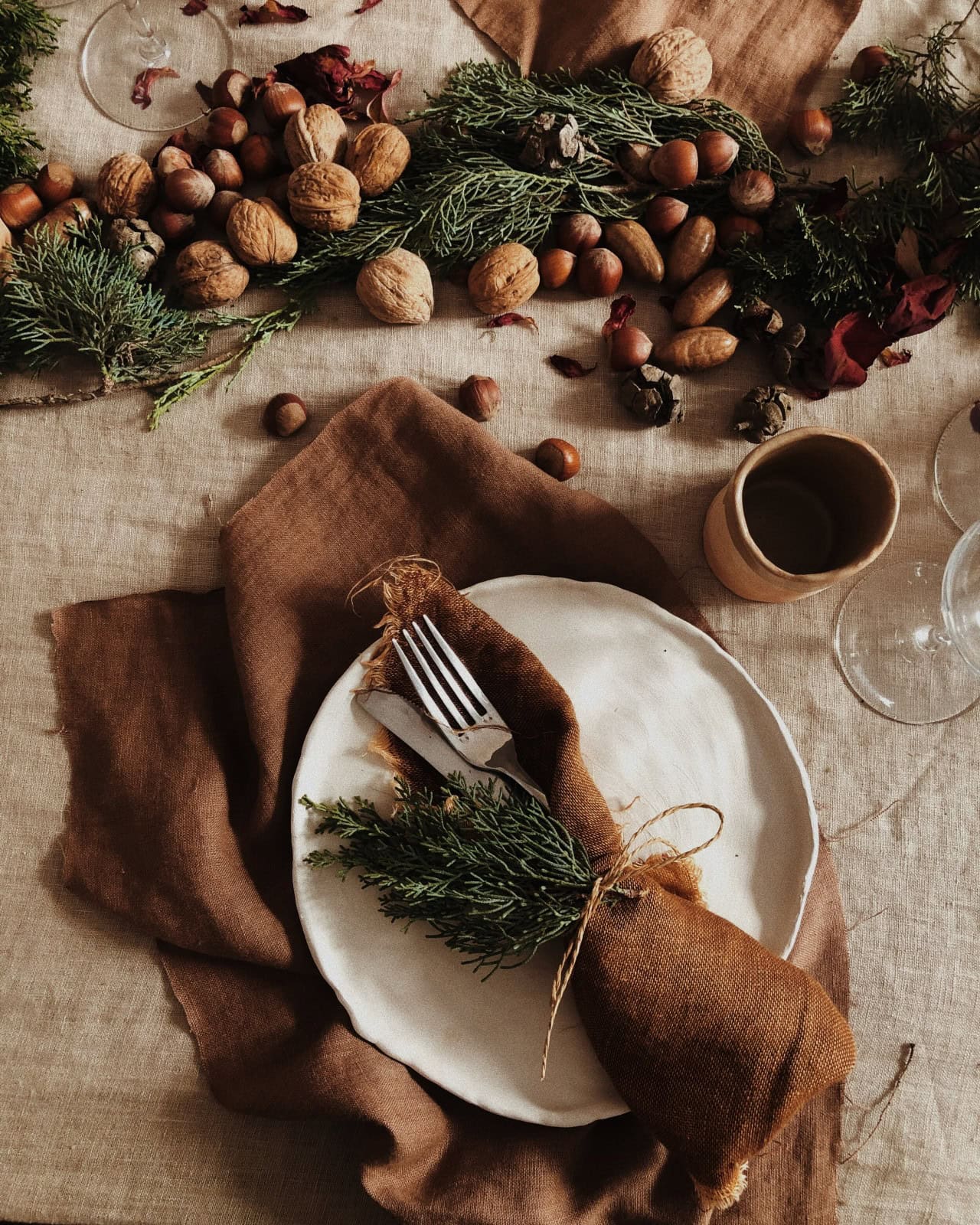 How to decorate for Thanksgiving example featuring warm color scheme table set up