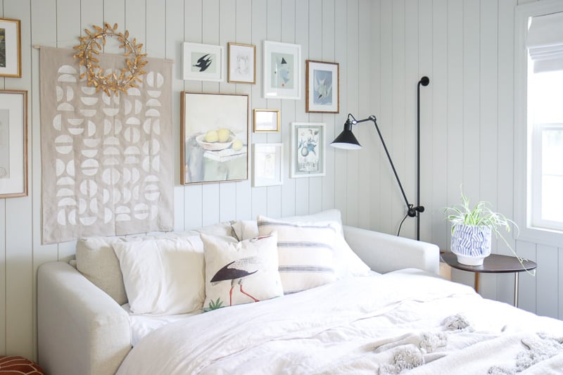 Guest room inspiration example showcasing a guest room in traditional modern neutral decor style