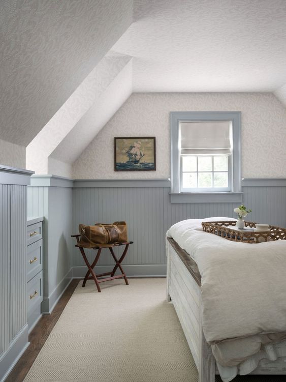 Guest room inspiration example showcasing a bedroom in traditional light blue
